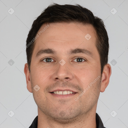 Joyful white young-adult male with short  brown hair and brown eyes