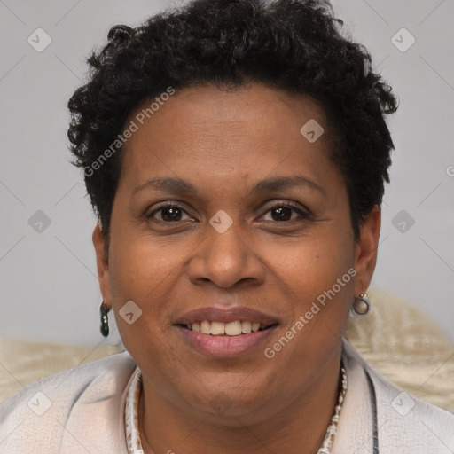 Joyful black adult female with short  brown hair and brown eyes