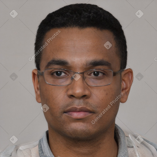 Neutral latino young-adult male with short  black hair and brown eyes