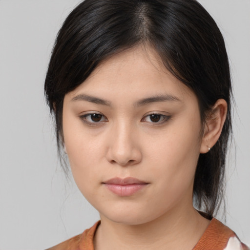 Neutral asian young-adult female with medium  brown hair and brown eyes