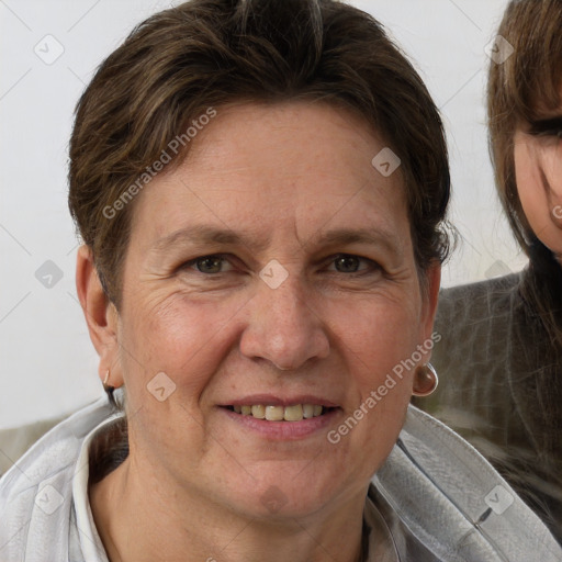 Joyful white adult female with short  brown hair and brown eyes