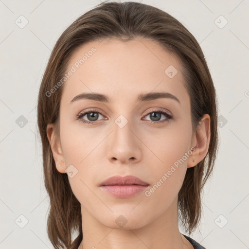 Neutral white young-adult female with medium  brown hair and grey eyes