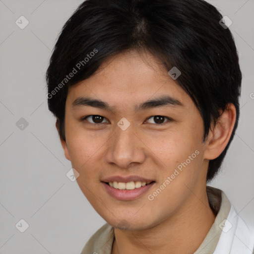 Joyful asian young-adult male with short  brown hair and brown eyes