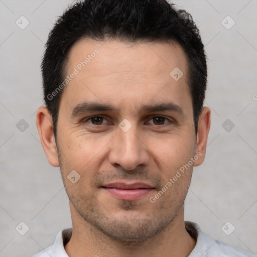 Joyful white young-adult male with short  brown hair and brown eyes