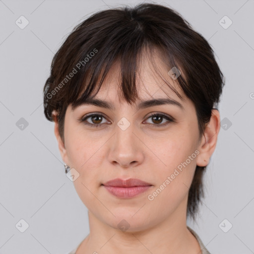 Joyful white adult female with medium  brown hair and brown eyes