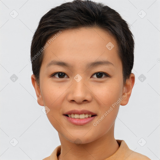 Joyful asian young-adult female with short  brown hair and brown eyes