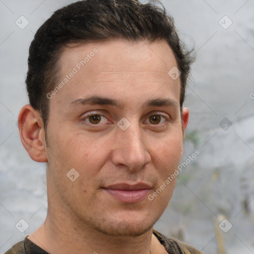 Joyful white adult male with short  brown hair and brown eyes