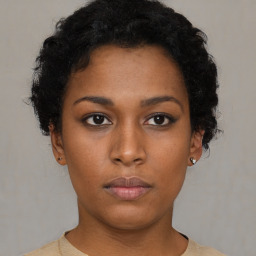 Neutral black young-adult female with short  brown hair and brown eyes