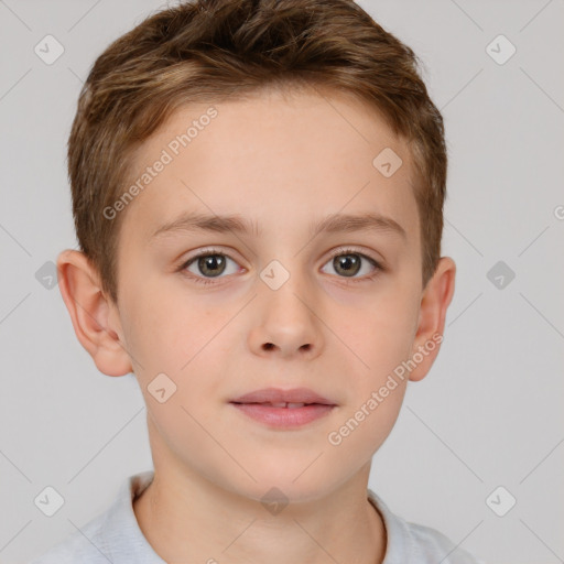 Joyful white child male with short  brown hair and brown eyes