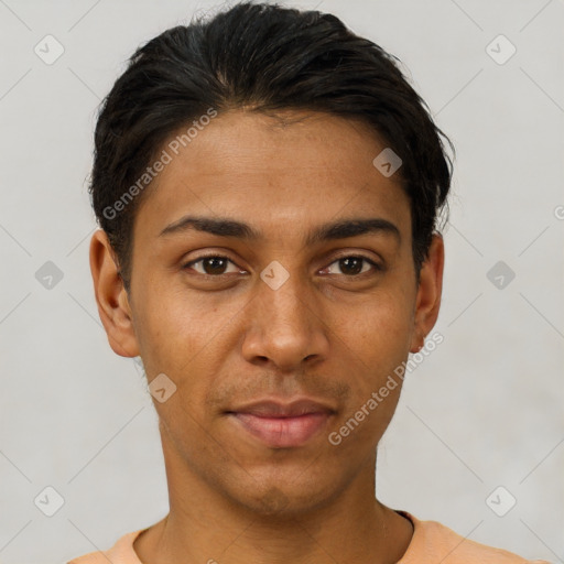 Joyful latino young-adult male with short  black hair and brown eyes