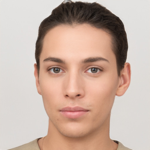 Neutral white young-adult male with short  brown hair and brown eyes