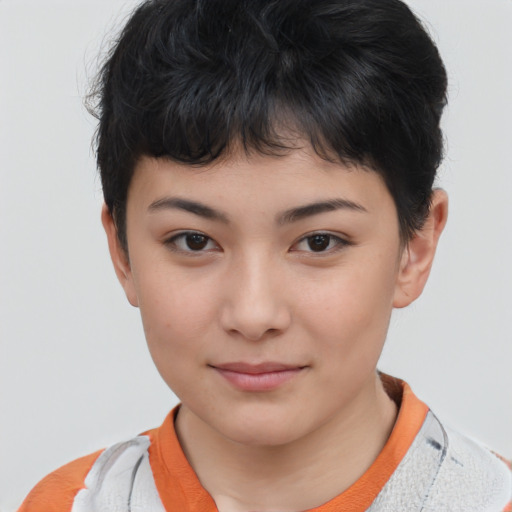 Joyful asian child female with short  brown hair and brown eyes