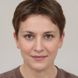 Joyful white young-adult female with short  brown hair and brown eyes