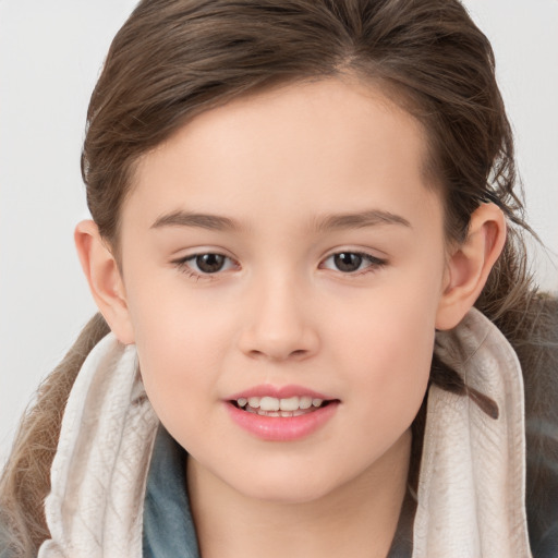 Joyful white child female with long  brown hair and brown eyes