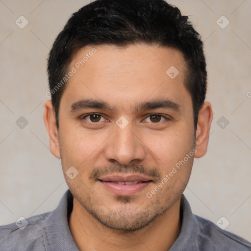 Joyful white young-adult male with short  black hair and brown eyes