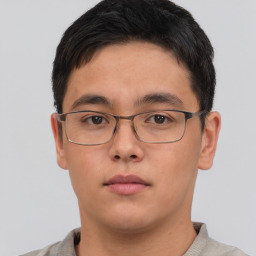 Neutral asian young-adult male with short  brown hair and brown eyes