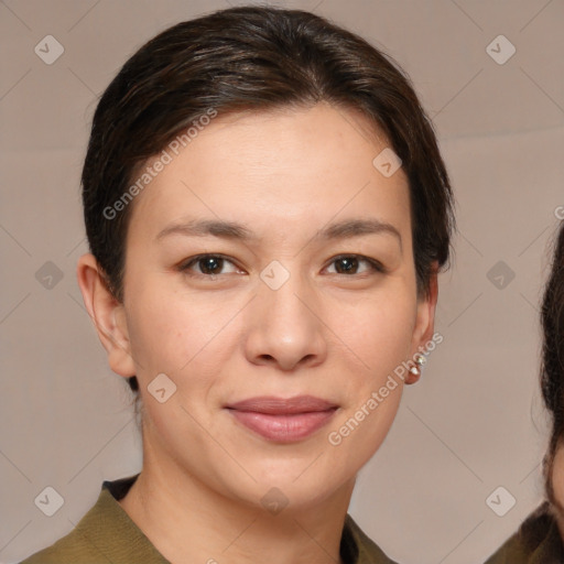 Joyful white young-adult female with medium  brown hair and brown eyes