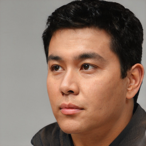 Neutral asian young-adult male with short  black hair and brown eyes