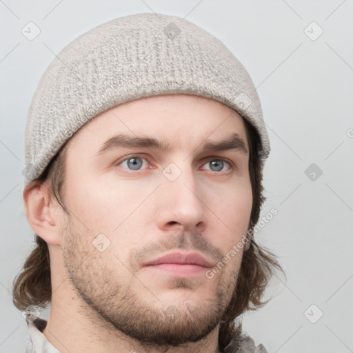 Neutral white young-adult male with short  brown hair and grey eyes