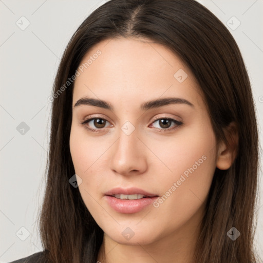 Neutral white young-adult female with long  brown hair and brown eyes