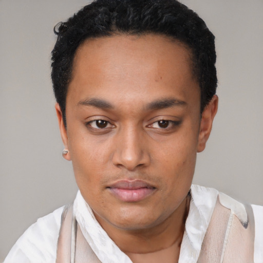 Neutral latino young-adult male with short  black hair and brown eyes