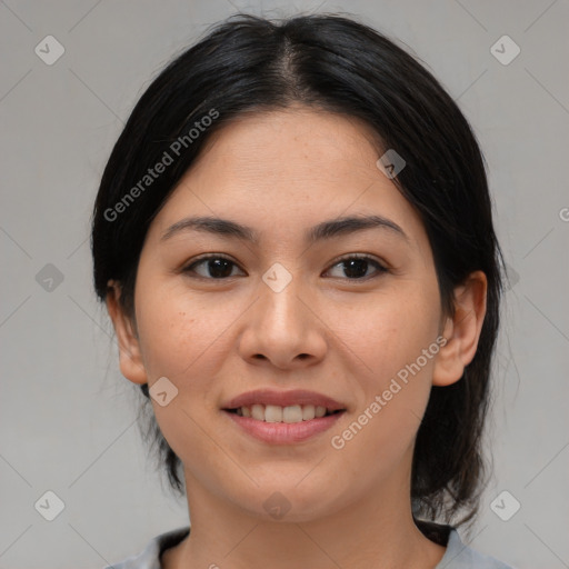 Joyful asian young-adult female with medium  black hair and brown eyes