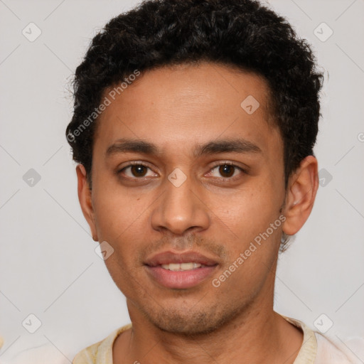 Joyful latino young-adult male with short  brown hair and brown eyes