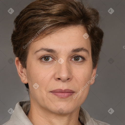 Joyful white adult female with short  brown hair and grey eyes