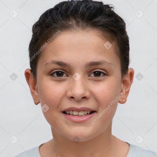 Joyful white child female with short  brown hair and brown eyes