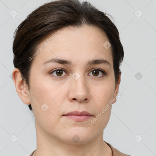 Neutral white young-adult female with short  brown hair and brown eyes