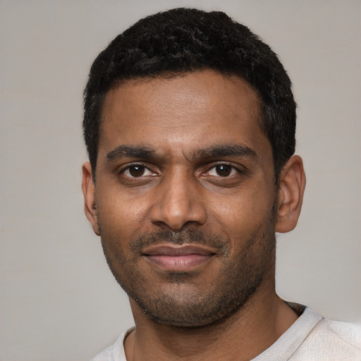 Neutral black young-adult male with short  black hair and brown eyes