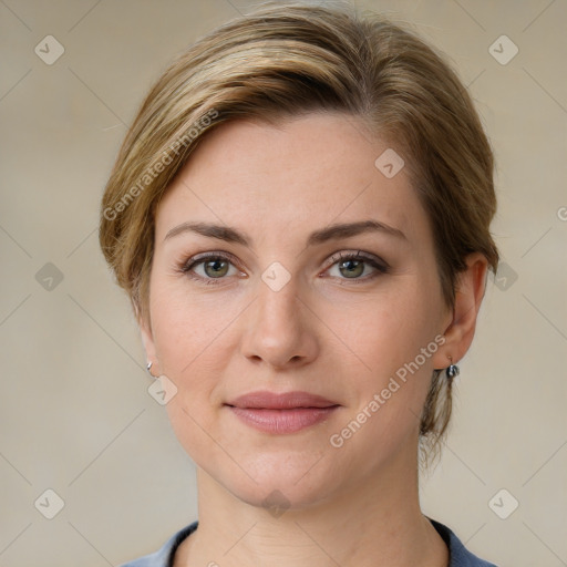 Joyful white young-adult female with medium  brown hair and grey eyes