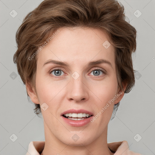 Joyful white young-adult female with short  brown hair and grey eyes