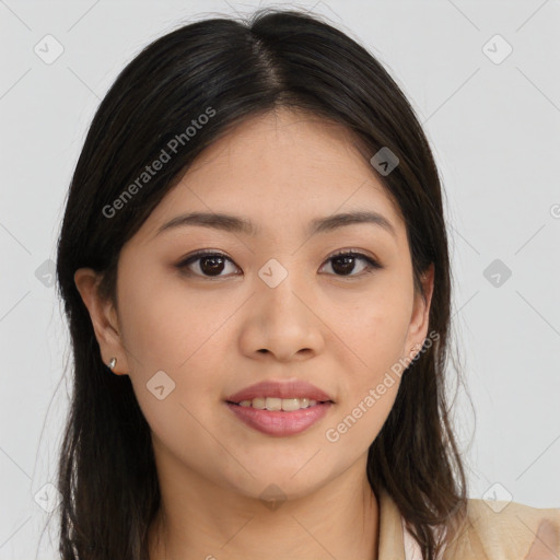 Joyful asian young-adult female with long  brown hair and brown eyes