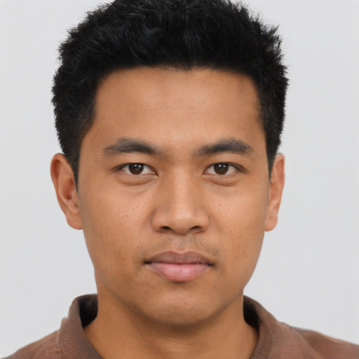 Neutral asian young-adult male with short  black hair and brown eyes