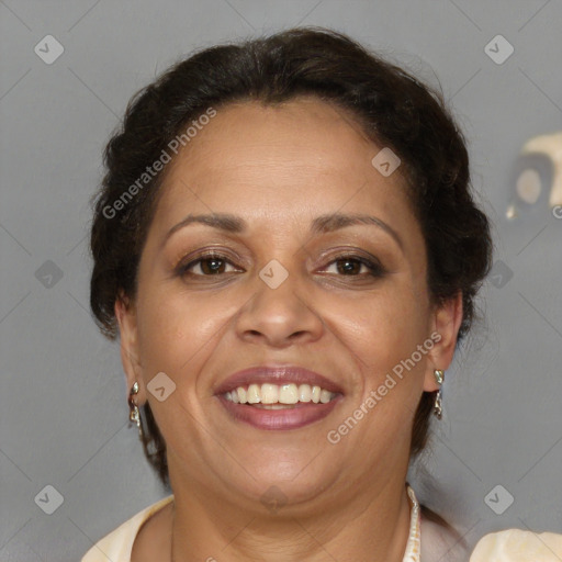 Joyful latino adult female with short  brown hair and brown eyes