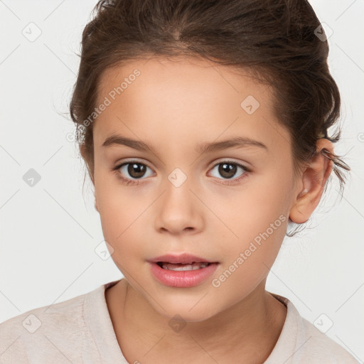 Joyful white child female with short  brown hair and brown eyes