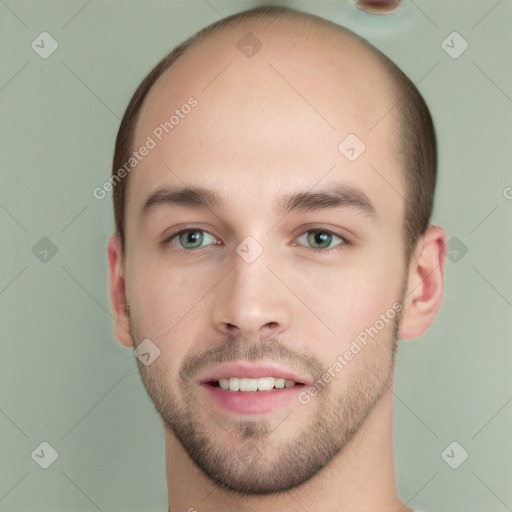 Joyful white young-adult male with short  brown hair and green eyes