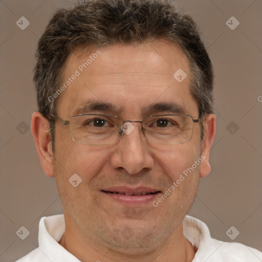 Joyful white middle-aged male with short  brown hair and brown eyes