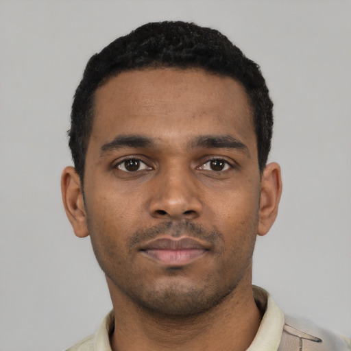 Neutral black young-adult male with short  black hair and brown eyes