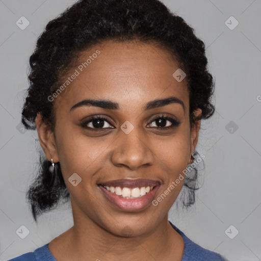 Joyful black young-adult female with medium  black hair and brown eyes