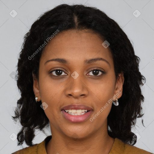 Joyful black young-adult female with long  brown hair and brown eyes