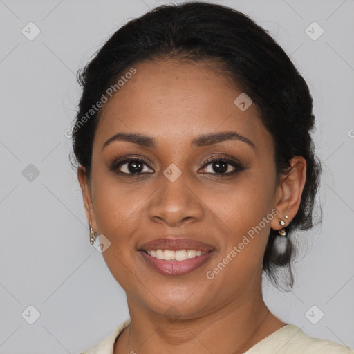 Joyful black young-adult female with medium  brown hair and brown eyes