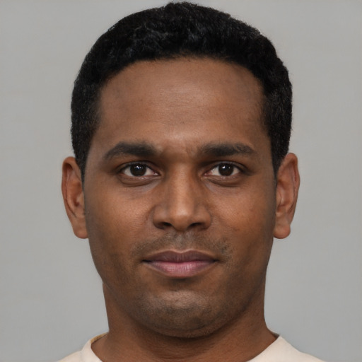 Neutral black young-adult male with short  black hair and brown eyes