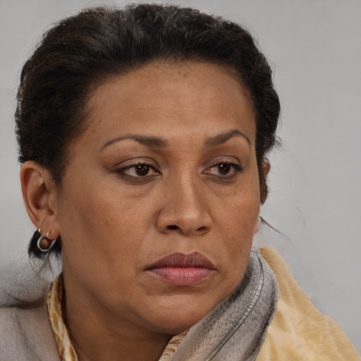 Neutral black adult female with short  brown hair and brown eyes