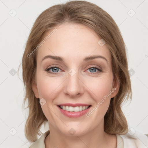 Joyful white young-adult female with medium  brown hair and blue eyes