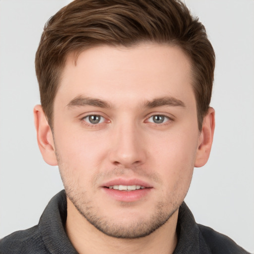 Neutral white young-adult male with short  brown hair and brown eyes