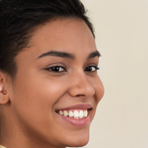 Joyful white young-adult female with short  brown hair and brown eyes