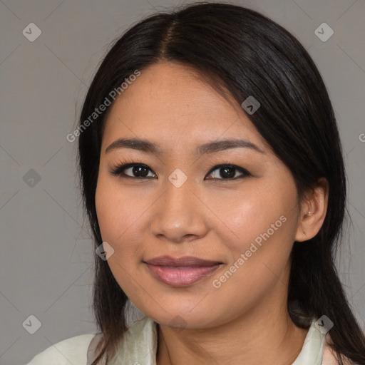 Joyful asian young-adult female with medium  brown hair and brown eyes