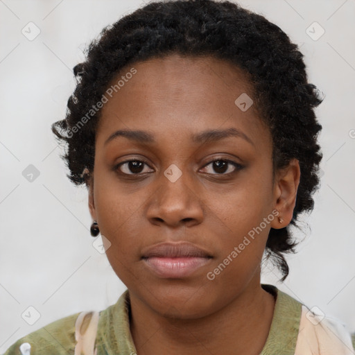 Neutral black young-adult female with medium  brown hair and brown eyes